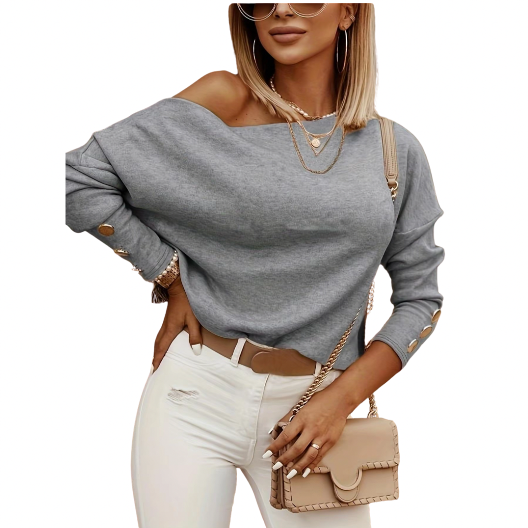 Camiseta de mujer con cuello asimétrico y botones decorativos